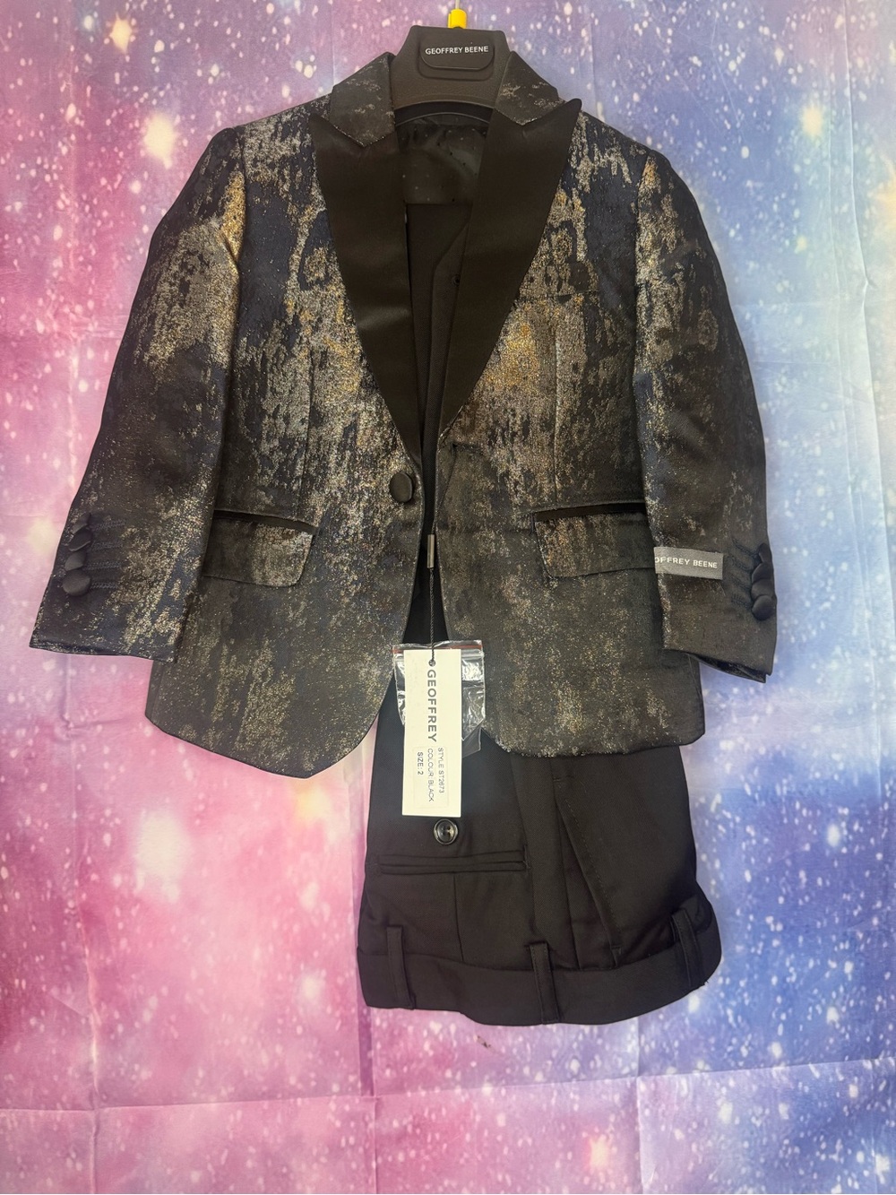 Geoffrey Beene boy's sparkle tuxedo jacket in black and gold with black pants